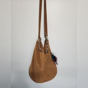 Leather hobo bag in cognac color studded